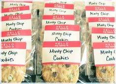 cookies are wrapped in plastic and labeled with name tags for the cookie shoppe's