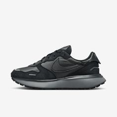 The iconic Nike Swoosh brings heritage style to a streamlined sneaker boasting a monochromatic design and a Waffle-textured sole for ultimate traction. Windows Reference, Vintage Running, Monochromatic Design, Black Nike Shoes, Nike Waffle, Purple Sneakers, Heritage Fashion, Women Lifestyle, Nike Swoosh