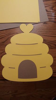 the paper is cut out to look like a beehive