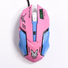 a pink and blue computer mouse on a white surface