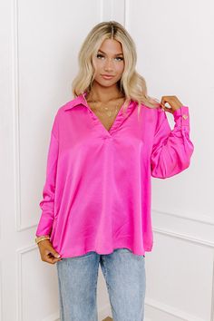 – Simple and stunning for a sweet night out – Lightweight, soft textured material – V-cut, collared neckline – Long, loose sleeves with button closure cuffs – Relaxed, flattering silhouette that ends in a straight upper-thigh hemline Chic Party Top With Collared Neckline, Trendy Pink Blouse For Date Night, Chic Pink Solid Color Top, Pink Fall Blouse For Night Out, Pink Long Sleeve Blouse For Night Out, Chic Solid Pink Top, Pink Long Sleeve Top For Night Out, Trendy Pink Blouse With Collar, Trendy Pink Collared Blouse