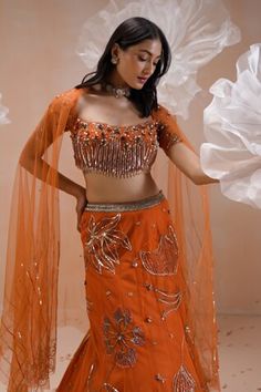 Burnt orange net mermaid lehenga with an attached cancan and floral motifs, sequins and zari hand embroidery. Comes with a padded blouse and dupatta. - Aza Fashions Mermaid Lehenga, Padded Blouse, Set Women, Floral Motifs, Aza Fashion, Floral Motif, Burnt Orange, Lehenga, Hand Embroidered