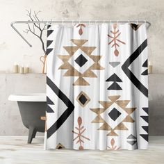 a shower curtain with an abstract design in gold, black and white on the outside