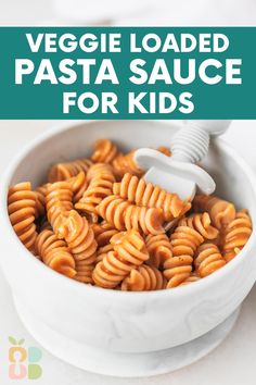 a white bowl filled with pasta sauce for kids