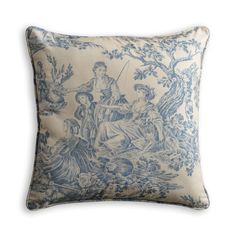 a blue and white pillow with an image of a man sitting on a tree branch