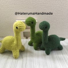 three crocheted stuffed animals sitting next to each other