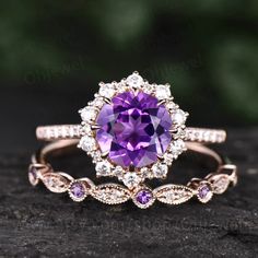 "This is a 2 carat natural engagement ring in solid gold,about 8mm round cut. The accent stones are moissanites. The matching band stones are moissanites and Amethyst. It can be made in any ring size. However please contact me to custom make it to a special big or small size. It can be made in white gold,rose gold or yellow gold with 14k or 18k. However for some people who are nickel allergic,I can also make it to 925 sterling silver to make you can wear it. The ring is handmade,very high qualit Amethyst Engagement Ring Rose Gold, Amethyst Rings Engagement, Amethyst Wedding Ring Set, Wedding Ring Purple Stone, Amythest Wedding Rings, Wedding Rings Amethyst, Purple Diamond Solitaire Jewelry, Purple Solitaire Diamond Jewelry, Wedding Jewelry With Halo Setting In Purple