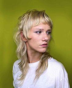 Female blonde long shaggy haircut Shaggy Hime Haircut, Elvish Shaggy Mullet, Edgy Wavy Haircuts, Feminine Mullet Shag, Straight Mullet Hairstyle Women, Choppy Mullet, Long Shaggy Mullet, Feminine Mullet, Mullet Haircut Woman