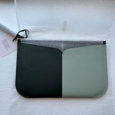 Material Smooth Italian Leather Features Large Wristlet Interior Credit Card Pocket 6"H X 10"W Imported Style No. Pwru7164-1 Green Envelope Clutch For Everyday Use, Green Pouch Wristlet For Daily Use, Modern Laptop Sleeve Clutch Pouch, Kate Spade Zipper Pouch For Everyday Use, Kate Spade Everyday Zipper Pouch Bag, Kate Spade Rectangular Travel Clutch, Kate Spade Rectangular Clutch For Travel, Rectangular Kate Spade Clutch For Travel, Black Clutch Bags