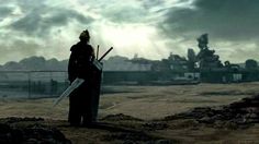 a man standing on top of a dirt field holding two swords