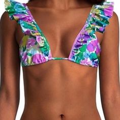 A Pretty Floral Print Bikini Top Featuring Ruffled Detailing. Ruffle Detail Tie Closure Polyamide/Elastane Hand Wash Imported Purple Ruffled Swimwear For Vacation, Ruffled Triangle Top Swimwear For Pool, Purple Ruffled Swimwear For Beach Season, Purple Ruffled Swimwear For Beach, Purple Ruffled Beachwear Swimwear, Pink Ruffled Tropical Swimwear, Pink Tropical Ruffled Swimwear, Tropical Pink Ruffled Swimwear, Purple Beachy Swimwear For Spring