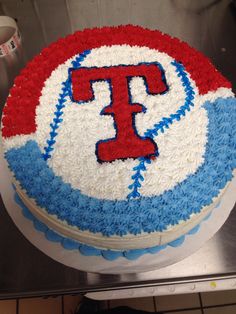 a cake decorated with red, white and blue frosting