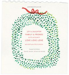 a christmas card with an ornament in the shape of a wreath