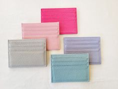 📿Slim Leather Card Holder - Pastel Colours📿 💎Our beautiful genuine ultra-slim real leather card holder has space for up to 6 cards with a central money pocket for folded notes or coins. Choice of pastel colours - dark pink, light pink, light grey, grey blue and light blue. Fits perfectly in your pocket or small bag for a busy day or a night out! A simple, classic and practical alternative to a traditional wallet. 🔥More Information: 🔥Material - Genuine Soft Leather 🔥Approx Dimensions - 10.2cm x 7.5cm 💕See our complete range of colours at https://www.etsy.com/uk/listing/1003569809/slim-fine-leather-card-holder-our?click_key=2ad7e6180a815abab8edb9064be45d54d22f1589%3A1003569809&click_sum=cd43a1fa&ref=hp_opfy-5&frs=1💕 Sewing Wallet, Money Holders Card, Money Holder, Card Holder Purse, Card Purse, Leather Keyring, Card Sleeve, Leather Card Holder, Pastel Colours