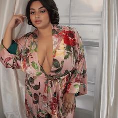 Experience the Beauty of the Peach Garden Floral robe The Peach Garden floral robe combines soft peach tones with vibrant floral prints for an elegant touch. Perfect for lounging or unwinding, this floral robe offers a luxurious feel with effortless style. Elegant long sleeve, long robe, kimono with invisible side seam pockets. Exclusive QWR pattern features a soft peach hue with oversized bold floral peony patterns in red, yellow and green florals for a fresh, garden-inspired look. Prominent co Pink Floral Print Kimono For Loungewear, Pink Spring Robe For Relaxation, Feminine Floral Print Robe For Loungewear, Pink Robe For Spring Relaxation, Floral Print Sleepwear With Kimono Sleeves, Feminine Open Front Robe For Loungewear, Floral Print Kimono Sleeves Sleep Robe, Pink Robe For Lounging In Spring, Pink Long Sleeve Robe With Floral Print