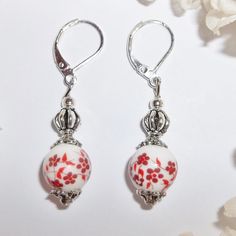 Red And White Flower Earrings Dangle Set Silver Dangle Drop Beaded Gift 4065 This Costume Jewlery Beaded Earring Set Is Brand New And Was Handmade By Me - Wvluckygirl Handcrafted From Red, Orange, And White Flowered Glass Beads. They Also Have Silver Toned Costume Jewelry Beads Which Were Antiqued In Black. The Pair Dangle & Drop From 925 Sterling Silver Lever Backs For Women's Pierced Ears. Measure 1 5/8 Inches Long And About 3/8 Inch Wide. Each Single Earring Weighs About 2.4 Grams. Lightweigh Elegant Red Flower Earrings With Ear Wire, Red Beaded Flower Earrings, White Flower Earrings With Dangling Beads For Gift, White Flower-shaped Jewelry With Dangling Beads, Elegant Handmade Red Flower Earrings, Elegant Red Handmade Flower Earrings, Red Flower-shaped Jewelry With Dangling Beads, Elegant Red Beaded Flower Earrings, Flower Earrings Dangle