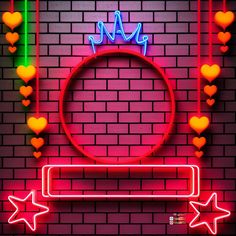 a neon sign that says love is in front of a brick wall with hearts and stars