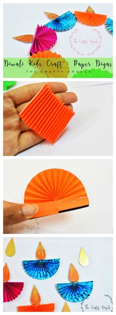 an orange and blue paper fan is being held by someone's hand with the other hand