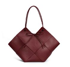 Elevate your style with this stunning deep red tote bag! 🌹 Its unique diamond shape and textured leather design make it the perfect statement piece for any outfit. Whether you’re heading to a meeting or a casual day out, this bag combines elegance with practicality. The soft bow detail adds a touch of charm, while the spacious interior makes it as functional as it is fashionable. A must-have for every fashion-forward wardrobe! #ToteBag #FashionAccessories #StatementPiece #RedBag #ChicStyle #LeatherBag” Burgundy Clothes, Burgundy Bag, Red Tote Bag, Red Tote, Quality Handbags, Genuine Leather Handbag, Suede Fabric, Unique Diamonds, Bag Handle