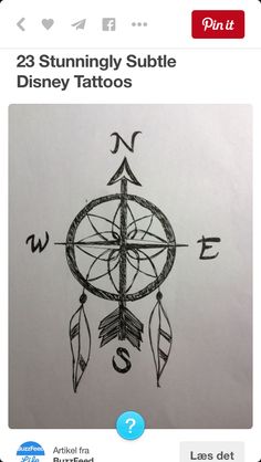 a drawing of a compass with arrows and the word tattoo on it's side