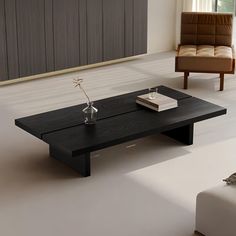 a black coffee table in the middle of a living room