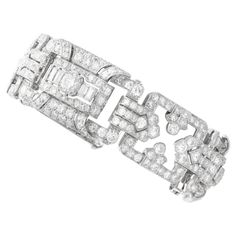 A magnificent, fine and impressive antique 1920's 17.48 carat diamond and platinum Art Deco bracelet; part of our diverse antique luxury Art Deco jewellery collections. This stunning, fine and impressive antique Art Deco diamond bracelet has been crafted in platinum. The articulated bracelet is composed of three pierced decorated rectangular designs, alternating with square-shaped links, all in the iconic geometric, Art Deco manner. The three rectangular links each bear a stunning feature pavé s Antique Luxury, Art Deco Jewellery, 1920 Art Deco, Bracelet Art, Platinum Bracelet, Art Deco Bracelet, 1920s Art Deco, Luxury Art, Deco Jewelry