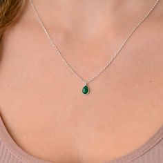 This dainty emerald green teardrop pendant necklace has a delicate silver chain. The chain is solid sterling silver 925., and there is an extension so that the size can be adjusted. There are different stonees to choose from. The stones are natural stones and no 2 are identical, but they are similar. If you would like a custom order or have any questions please contact me, thanks. Silver Necklace Green Stone, Delicate Chain Emerald Necklace For May Birthstone, Green Drop Necklace For May Birthstone, Green Teardrop Necklace For May Birthstone, Sterling Silver Teardrop Drop Necklace With Delicate Chain, Silver Teardrop Pendant Birthstone Necklace, Green Teardrop Jewelry With Delicate Chain, Emerald Teardrop Pendant Necklace For May Birthstone, Silver Necklace With Delicate Chain For May Birthstone