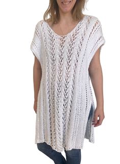 Hand-knit in a lightweight, cotton blended yarn, The Layla Kaftan is an easy summer staple. The lace stitch adds texture and is a unique feature of this timeless warm-weather classic. From sitting on the beach in your favorite swimwear, to a stroll into town paired with your favorite summer pants, this knit will be a no-brainer all season long. Each Ready Made Third Piece is individually hand-knit through our team of knitters based Boston, Massachusetts and produced in small batches. PRODUCT DET Spring White Knit Cover-up, Beach V-neck Stretch Knit Top, Open Knit Stretch Vacation Knit Top, Stretch Knit Top For The Beach, Stretch Open Knit Top For Vacation, Vacation Stretch Open Knit Top, Summer Vacation Crochet Top With Pointelle Knit, Summer Beach Crochet Top With Pointelle Knit, Spring Knit Cover-up For Warm Weather