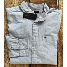 Tommy Hilfiger Chambray Long Sleeve Button Down Shirt Blue Mens Medium New Condition: New With Tags Shipping: One Day Handling. Returns: 30 Day Returns Paid For By Buyer. Honest Seller With Items From A Clean, Smoke Free Home. Thank You For Looking At My Item And Let Me Know If You Have Any Questions. Blue Collared Tommy Hilfiger Shirt, Tommy Hilfiger Blue Collared Shirt, Tommy Hilfiger Cotton Button-up Shirt, Fitted Blue Tommy Hilfiger Shirt, Blue Tommy Hilfiger Button-up Top, Tommy Hilfiger Blue Top For Workwear, Tommy Hilfiger Blue Top For Work, Tommy Hilfiger Casual Shirt With Buttons, Tommy Hilfiger Classic Shirt With Button Closure