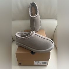 Brand New, Ugg Women's Tasman In Size 7 Us. Sold Out Online! Comes With Original Box & 100% Authentic. Purchased From Footlocker. Rare Find! Color Is Goat (Smokey Grey). Style # 5955-Goa The Tasman Is A Longtime Fan Favorite Continuously Rediscovered Generation After Generation Due To Its Ultra-Lightweight, Durable Outsole, Plush Wool Lining, And Suede Uppers. It Goes With Anything And Has An Easy Slip-On Silhouette That Will Stay Timeless Forever. This Product Was Made In A Factory That Support Ugg Tasman Slippers Grey, Ugg Tasman Slippers Driftwood, Uhh Tasman Slipper, Ugg Slippers Gray, Grey Ugg Slippers, Grey Uggs, Uggs Moccasins, Ugg Scuffette, Ugg Slides