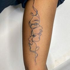 a woman's leg with a line drawing on the side of her leg,