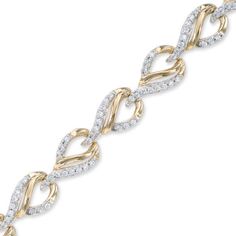 Fan the fires of fashion with this eye-catching diamond bracelet. Created in warm 10K gold, this bracelet features open flame-shaped links, lined with shimmering diamonds and arranged in a glittering garland. Designed to transition from day to night with ease and elegance, this bracelet captivates with 1 ct. t.w. of diamonds and a right polished shine. The 7.25-inch bracelet secures with a tongue and groove clasp. Trending Bracelets, Antique Gold Jewelry, Gold Ring Designs, Peoples Jewellers, Bracelets Gold Diamond, Gold Bracelet For Women, Stylish Bracelet, Expensive Jewelry, Elegant Bracelet