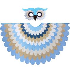 a blue and white paper owl with big eyes