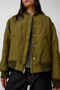 Quilted jacket with a slightly cropped, boxy silhouette and faux fur collar. Features contrasting ribbed waistband and cuff as well as a hidden zip closure with front snap placket. Perfect for everyday wear. Army Cargo Pants, Denim Hat, No 6, Faux Fur Collar, Engineered Garments, Patagonia Womens, Kids Sleepwear, Padded Jacket, Sweater And Shorts