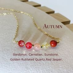 All necklaces are handmade and designed by us. In our store you will find high quality jewelry and in a reasonable price. -Jewelry Description- This set of jewelry s made up of Red Jasper, Golden Rutilated Quartz, Sardonyx, Carnelian and Sunstone. It would be a gift for those who love autumn season and colors. "Autumn leaves don't fall, they fly. They take their time and wander on this their only chance to soar."-Delia Owens All crystal beads in our store are natural and in high grade. -Material Red Agate Gemstone Necklace, Carnelian Beaded Necklaces As Gifts, Red Crystal Necklace With Natural Stones, Carnelian Beaded Necklaces For Gifts, Round Carnelian Beaded Necklaces For Gifts, Carnelian Gemstones As Gifts, Carnelian Round Beads Necklace Gift, Red Gemstone Crystal Necklace For Healing, Amber Round Beads Crystal Necklace For Gift