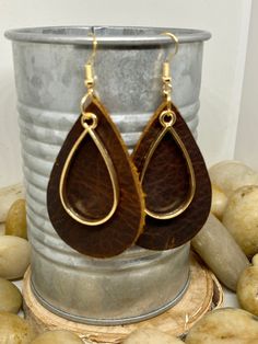 "Handmade, genuine leather charm teardrop earrings measuring Aprox 2\" long in a variety of colors and metal color options either tools or silver. Available options are: Weathered brown leather teardrop earrings with coordinating charm in silver or gold Camel, cognac teardrop earrings with coordinating charm in silver or gold Hunter green, Forrest green teardrop earrings with coordinating charm in silver or gold Teardrop earrings, gold earrings, silver earrings, fall earrings, camel earrings, co Gold Teardrop Earrings, Teardrop Earrings Gold, Large Necklace, Glitter Earrings, Fall Earrings, Custom Earrings, Fall Jewelry, Green Earrings, Black Earrings