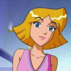 a cartoon girl with blonde hair and blue eyes