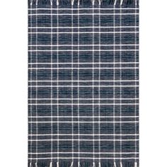 a blue and white plaid rug with fringes