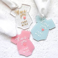 three different colored tags with thank you and jane mine written on them in gold, silver, or pink