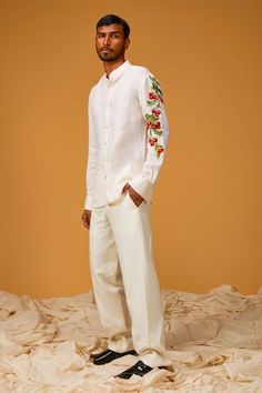 White linen shirt with cherry embroidery on the sleeves. - Aza Fashions Fitted Cotton Shirt With Embroidered Cuffs, White Cotton Shirt With Embroidered Cuffs, Traditional Fit Cotton Tops For Spring, Spring Cotton Tops With Traditional Fit, White Traditional Fit Shirt For Spring, Traditional Fit White Shirt For Spring, White Regular Fit Shirt For Spring, Cherry Embroidery, Linen Embroidery