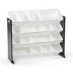 a black and white shelf with six trays on it's sides, one is empty