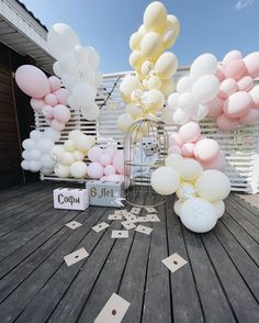 balloons and confetti are scattered on the ground