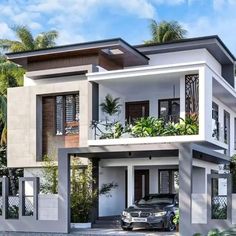 a car is parked in front of a two story house with plants on the balconies