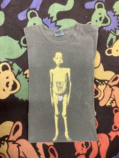 a t - shirt with an image of a man on it