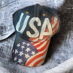 Nwt. Denim Baseball Cap With Hand Painted Usa On The Front. Glittery American Flag Going Up From The Rim Of The Hat To The One Side. Adjustable Back. Blue Baseball Cap For 4th Of July, Painted Ball Cap, Cap Painting Ideas, Painted Baseball Cap, Paper Boy Hat, Leather Bucket Hat, Hat Art, Denim Baseball Cap, Painted Hats