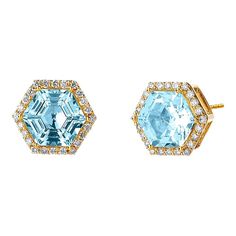 Created in 18 karat yellow gold  Blue topaz 3 carats approx.  Diamonds 0.20 carat approx.  Post backs for pierced ears  Limited Edition    Crafted from 18 karat yellow gold, these luxurious earrings boast an exquisite blue topaz of approximately three carats and are framed with dazzling diamonds of around 0.20 carats. Adorned with post backs to secure pierced ears, these limited-edition pieces radiate glamour and sophistication.    About the Designers    Drawing inspiration from little things, Dharmesh & Namrata Kothari have created an extraordinary and refreshing collection of luxurious jewels. True believers of destiny, they always feel that the possibilities of design - and life - are limitless when people work together. Formed in 2003, Syna Jewels has grown through enduring relationshi Luxury Yellow Gold Topaz Earrings, Yellow Gold Jewelry With Diamond Accents And Blue Topaz, Yellow Gold Blue Topaz Jewelry With Diamond Accents, Yellow Gold Earrings With Blue Topaz Gemstone, Octagon Yellow Gold Earrings With Prong Setting, Yellow Gold Octagon Earrings With Prong Setting, Formal Yellow Gold Topaz Earrings, Luxury Blue Topaz Earrings With Prong Setting, Yellow Gold Octagon Earrings With Diamond Cut