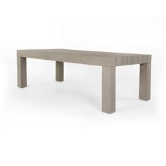 a long table made out of concrete on a white background