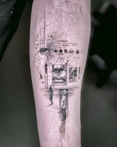 a man's leg with a tattoo on it and an eye in the middle