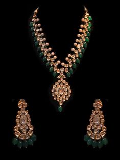 "Mahal Kundan Statement Necklace Set Beautiful strand of uncut kundan stones with a row of pearls on top is finished with a row of hanging emerald beads making this long necklace perfect for a sangeet function. The set includes a pair of matching earrings. Approximate earrings length is 3.75\". SET INCLUDES : Necklace & Earrings * Tikka can be added Details: Handcrafted Metal: Gold Plated, Metal Alloy Stone: Kundan, Pearls and Emerald Stones Closure: Post for Pierced Ears DELIVERY: * Ready T Sangeet Function, Kundan Long Necklace, Pearl Mala, Beads Making, Kundan Set, Bangles Indian, Indian Jewelry Sets, Emerald Bead, Jewellery Ideas