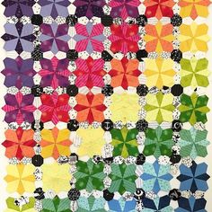 a colorful quilt with lots of different colors